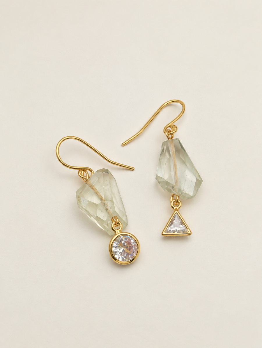 Gold-filled aquamarine drop earrings with cubic zirconia accents on a white background