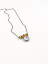 Silver coin pearl necklace with a round coin pendant and fine chain